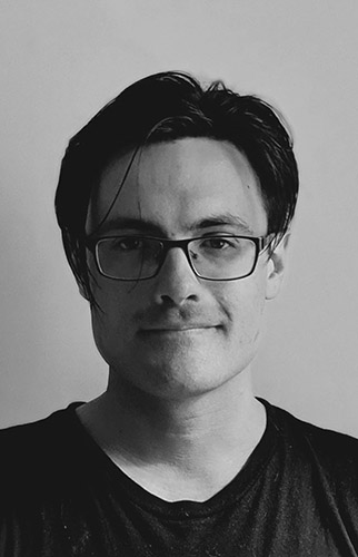 Black and white headshot of Nick Crockett